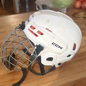 CCM White Helmet with Red Accents and Silver Cage